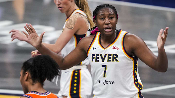 Aug 28, 2024; Indianapolis, Indiana, USA; Indiana Fever forward Aliyah Boston (7) reacts to a call during a game between the Indiana Fever and the Connecticut Sun at Gainbridge Fieldhouse. Mandatory Credit: Grace Smith-INDIANAPOLIS STAR-Imagn Images