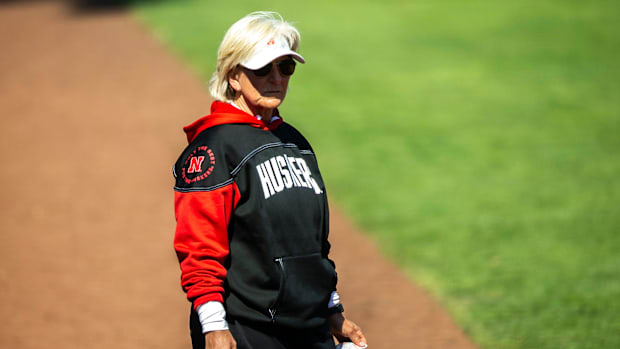 Nebraska head coach Rhonda Revelle watches during a NCAA Big Ten Conference softball game 