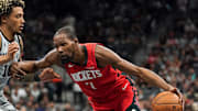 Nov 7, 2025; San Antonio, Texas, USA; Houston Rockets forward Kevin Durant (7) dribbles against San Antonio Spurs forward Jeremy Sochan (10) during the second quarter at Frost Bank Center. Mandatory Credit: Dustin Safranek-Imagn Images