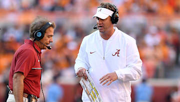 Oct 15, 2016; Knoxville, TN, USA;  Alabama Crimson Tide head coach Nick Saban talks with offensive coordinator Lane Kiffin along the sidelines during the second quarter at Neyland Stadium. Mandatory Credit: John David Mercer-Imagn Images