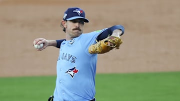Oct 28, 2025; Los Angeles, California, USA; Toronto Blue Jays pitcher Shane Bieber (57) pitches during the first inning against the Los Angeles Dodgers during game four of the 2025 MLB World Series at Dodger Stadium. Mandatory Credit: Kiyoshi Mio-Imagn Images