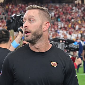 Washington Commanders offensive coordinator Kliff Kingsbury reacts after beating the Arizona Cardinals.