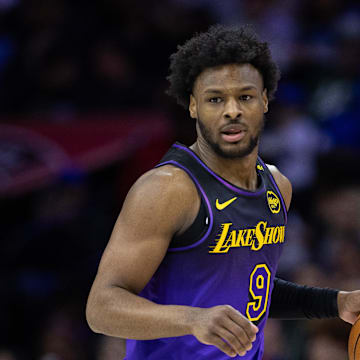 Jan 28, 2025; Philadelphia, Pennsylvania, USA; Los Angeles Lakers guard Bronny James (9) controls the ball against the Philadelphia 76ers at Wells Fargo Center. Mandatory Credit: Bill Streicher-Imagn Images