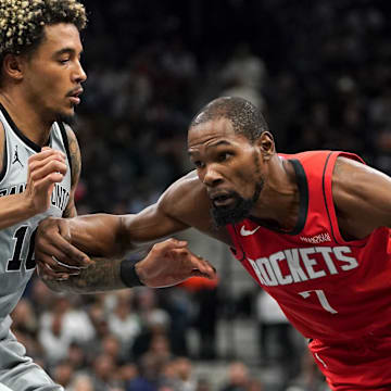 Nov 7, 2025; San Antonio, Texas, USA; Houston Rockets forward Kevin Durant (7) dribbles against San Antonio Spurs forward Jeremy Sochan (10) during the second quarter at Frost Bank Center. Mandatory Credit: Dustin Safranek-Imagn Images