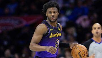 Jan 28, 2025; Philadelphia, Pennsylvania, USA; Los Angeles Lakers guard Bronny James (9) controls the ball against the Philadelphia 76ers at Wells Fargo Center. Mandatory Credit: Bill Streicher-Imagn Images
