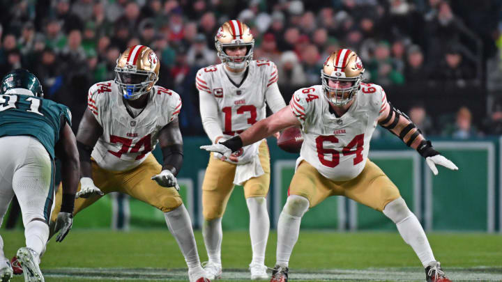 Dec 3, 2023; Philadelphia, Pennsylvania, USA; San Francisco 49ers offensive tackle Spencer Burford (74) and center Jake Brendel (64) block against the Philadelphia Eagles at Lincoln Financial Field. Mandatory Credit: Eric Hartline-USA TODAY Sports