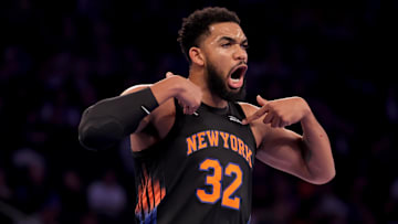 Nov 14, 2025; New York, New York, USA; New York Knicks center Karl-Anthony Towns (32) reacts during the first quarter against the Miami Heat at Madison Square Garden. Mandatory Credit: Brad Penner-Imagn Images