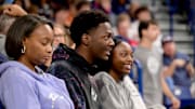 Recruit Sam Funches and his family watch Gonzaga’s Kraziness in the Kennel at the McCarthey Athletic Center. 