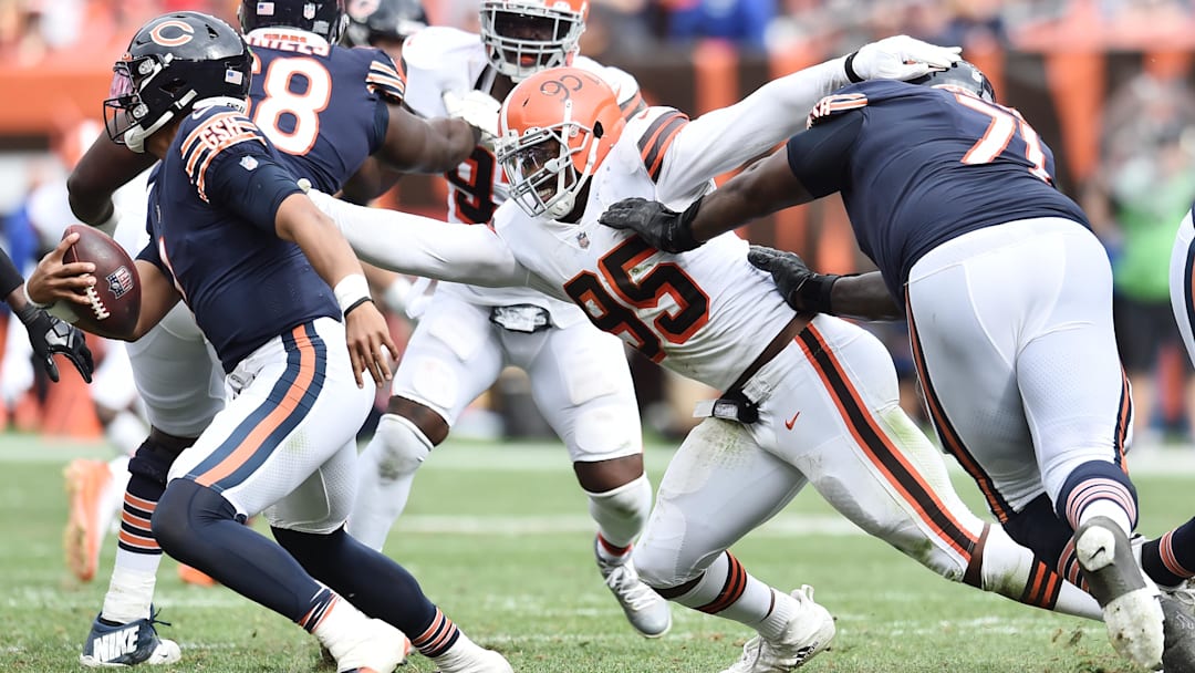 Myles Garrett fends off a block to get to Justin Fields. The Bears haven't had good success in three past games stopping the NFL sacks leader.