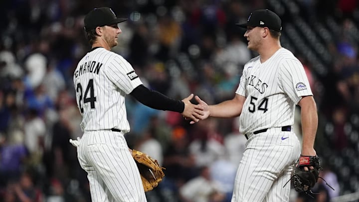 Jul 22, 2025; Denver, Colorado, USA; Colorado Rockies pitcher Seth Halvorsen (54) and third baseman Ryan McMahon (24) celebrate defeating the St. Louis Cardinals at Coors Field. Jul 22, 2025; Denver, Colorado, USA; Colorado Rockies pitcher Seth Halvorsen (54) and third baseman Ryan McMahon (24) celebrate defeating the St. Louis Cardinals at Coors Field.