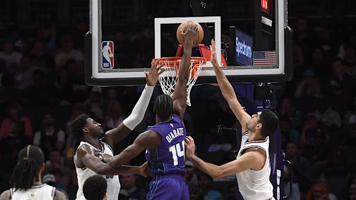 Apr 8, 2025; Charlotte, North Carolina, USA; Charlotte Hornets center Moussa Diabate (14) drives in during the second half against the Memphis Grizzlies at the Spectrum Center. Mandatory Credit: Sam Sharpe-Imagn Images Apr 8, 2025; Charlotte, North Carolina, USA; Charlotte Hornets center Moussa Diabate (14) drives in during the second half against the Memphis Grizzlies at the Spectrum Center. Mandatory Credit: Sam Sharpe-Imagn Images