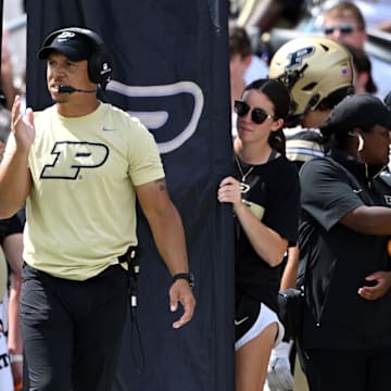 Purdue Boilermakers head coach Ryan Walters walks on the sidelines 