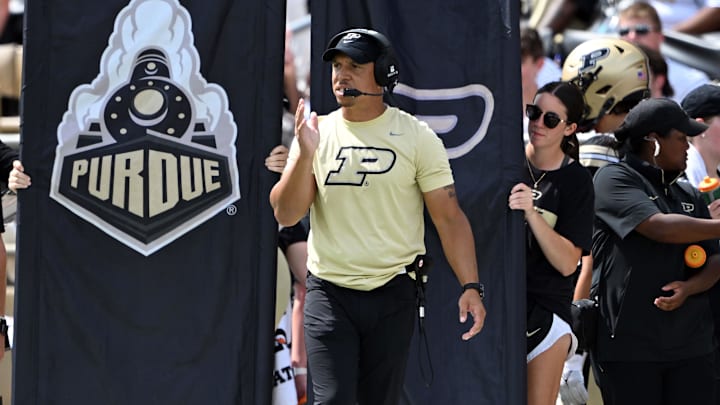 Purdue Boilermakers head coach Ryan Walters walks on the sidelines 