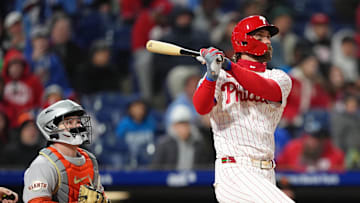 Apr 16, 2025; Philadelphia, Pennsylvania, USA; Philadelphia Phillies infielder Bryce Harper (3) hits a two-run home run against the San Francisco Giants in the fourth inning at Citizens Bank Park.