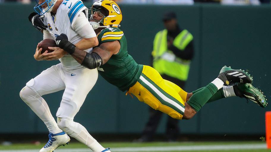 Micah Parsons flies in to wrap up Jared Goff from behind.
