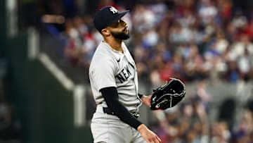 Aug 5, 2025; Arlington, Texas, USA;  New York Yankees relief pitcher Devin Williams (38) reacts during the eighth inning against the Texas Rangers at Globe Life Field. Mandatory Credit: Kevin Jairaj-Imagn Images