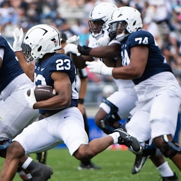 Penn State running back Tikey Hayes (23) carries the ball during the Blue-White Game at Beaver Stadium.