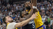 Apr 25, 2025; Minneapolis, Minnesota, USA; Minnesota Timberwolves guard Anthony Edwards (5) drives to the basket past Los Angeles Lakers guard Luka Doncic (77) and forward LeBron James (23) in the second half during game three of first round for the 2024 NBA Playoffs at Target Center. Mandatory Credit: Jesse Johnson-Imagn Images