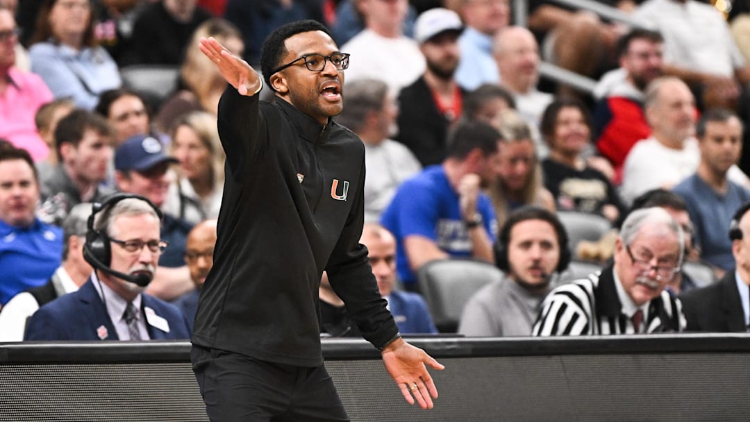 Mar 22, 2026; St. Louis, MO, USA; Miami Hurricanes head coach Jai Lucas calls a play during the first half against the Purdue Boilermakers during a second round game of the men's 2026 NCAA Tournament at Enterprise Center. Mandatory Credit: Jeff Le-Imagn Images