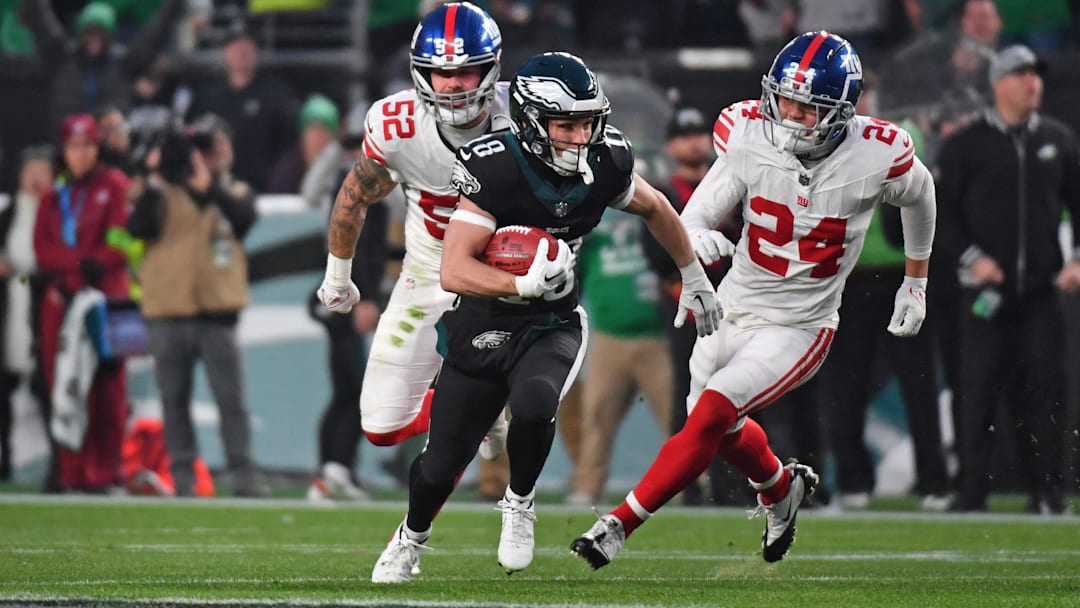 Dec 25, 2023; Philadelphia, Pennsylvania, USA;  Philadelphia Eagles wide receiver Britain Covey (18) returns a punt against the New York Giants during the first quarter at Lincoln Financial Field.
