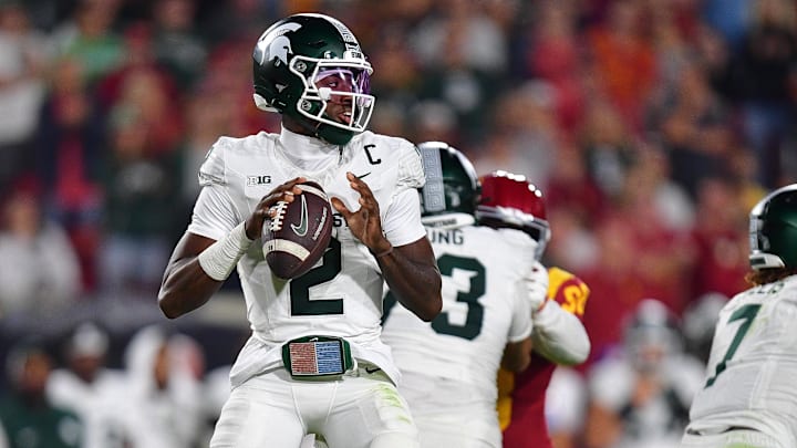 Michigan State Spartans quarterback Aidan Chiles drops back to pass against the Southern California Trojans.