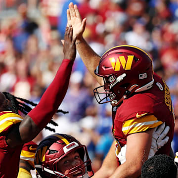 Sep 15, 2024; Landover, Maryland, USA; Washington Commanders place kicker Austin Seibert (3) celebrates with his teammates after making the game winning field goal against the New York Giants at Commanders Field. Mandatory Credit: Peter Casey-Imagn Images