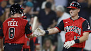 Chicago White Sox shortstop Colson Montgomery (12) celebrates with catcher Kyle Teel (8) after hitting a two-run home run against the Minnesota Twins at Rate Field. 