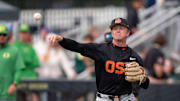 Oregon State infielder Trent Caraway throws to first for an out as the Oregon Ducks host the Oregon State Beavers on April 25, 2025, at PK Park in Eugene.