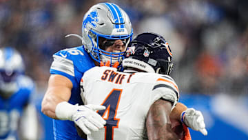 Detroit Lions linebacker Jack Campbell (46) tackles Chicago Bears running back D'Andre Swift (4) during the first half at Ford Field in Detroit on Sunday, Sept. 14, 2025.