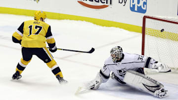 Dec 14, 2019; Pittsburgh, PA, USA;  Pittsburgh Penguins right wing Bryan Rust (17) scores the lone shootout goal past Los Angeles Kings goaltender Jonathan Quick (32) to win the game at PPG PAINTS Arena. The Penguins won 5-4 in a shootout. Mandatory Credit: Charles LeClaire-Imagn Images