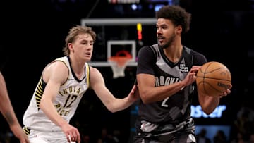 Dec 4, 2024; Brooklyn, New York, USA; Brooklyn Nets forward Cameron Johnson (2) looks to pass the ball against Indiana Pacers forward Johnny Furphy (12) during the third quarter at Barclays Center. Mandatory Credit: Brad Penner-Imagn Images