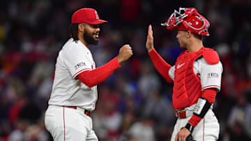 Apr 18, 2025; Anaheim, California, USA; Los Angeles Angels pitcher Kenley Jansen (74) and catcher Logan O'Hoppe (14) celebrate the victory against the San Francisco Giants at Angel Stadium. Mandatory Credit: Gary A. Vasquez-Imagn Images