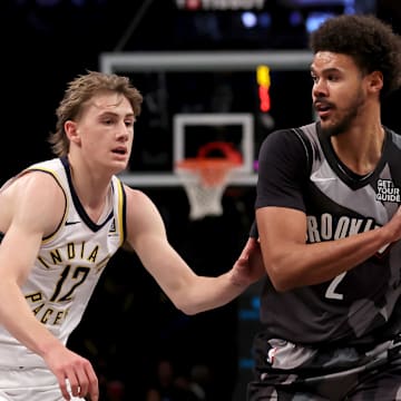 Dec 4, 2024; Brooklyn, New York, USA; Brooklyn Nets forward Cameron Johnson (2) looks to pass the ball against Indiana Pacers forward Johnny Furphy (12) during the third quarter at Barclays Center. Mandatory Credit: Brad Penner-Imagn Images