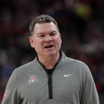 Nov 3, 2025; Las Vegas, NV, USA; Arizona Wildcats head coach Tommy Lloyd looks on during the first half of the Hall of Fame Series game against the Florida Gators at T-Mobile Arena. Mandatory Credit: Candice Ward-Imagn Images
