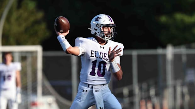 Elder quarterback Kaden Estep throws against Withrow in August.