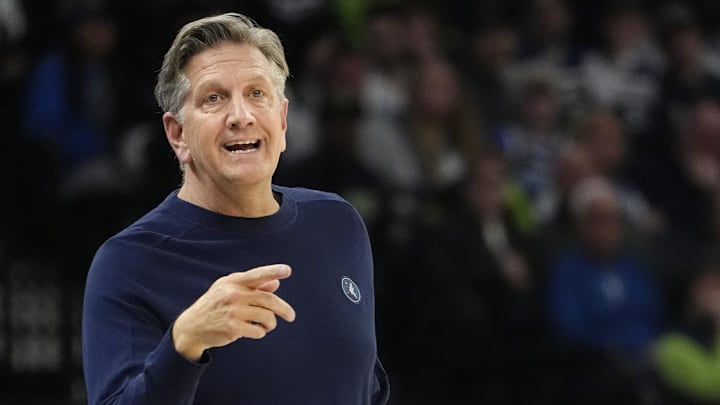 Mar 21, 2025; Minneapolis, Minnesota, USA; Minnesota Timberwolves head coach Chris Finch directs his team as they play the New Orleans Pelicans in the third quarter at Target Center. Mandatory Credit: Bruce Kluckhohn-Imagn Images