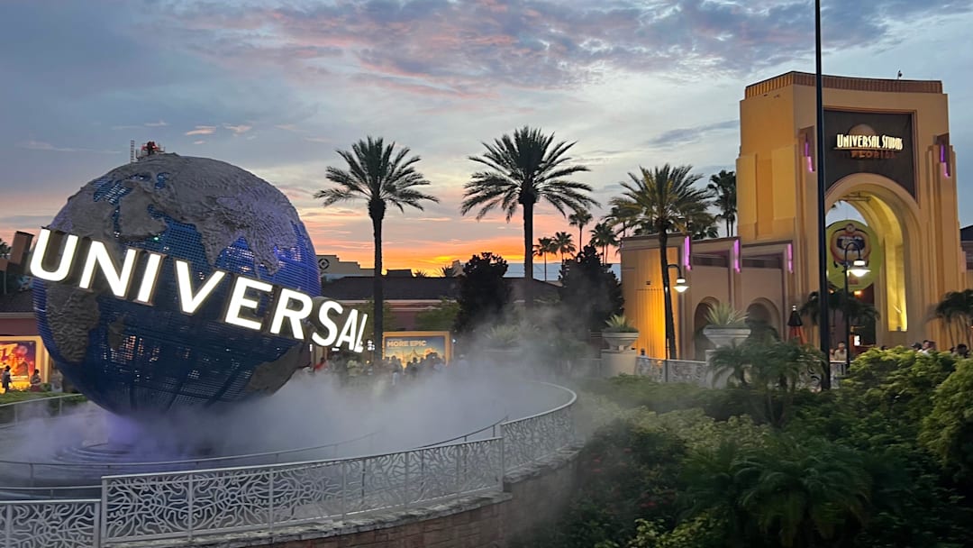 The iconic Universal globe slowly spins near the entrance to Universal Studios Florida on July 13, 2024.