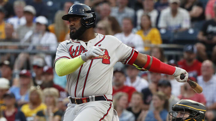 Aug 8, 2023; Pittsburgh, Pennsylvania, USA;  Atlanta Braves designated hitter Marcell Ozuna (20) hits a single against the Pittsburgh Pirates during the third inning at PNC Park. Mandatory Credit: Charles LeClaire-Imagn Images