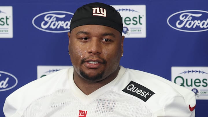 Jul 23, 2025; East Rutherford, NJ, USA; New York Giants defensive tackle Dexter Lawrence II (97) talks with media during training camp at Quest Diagnostics Training Center. 