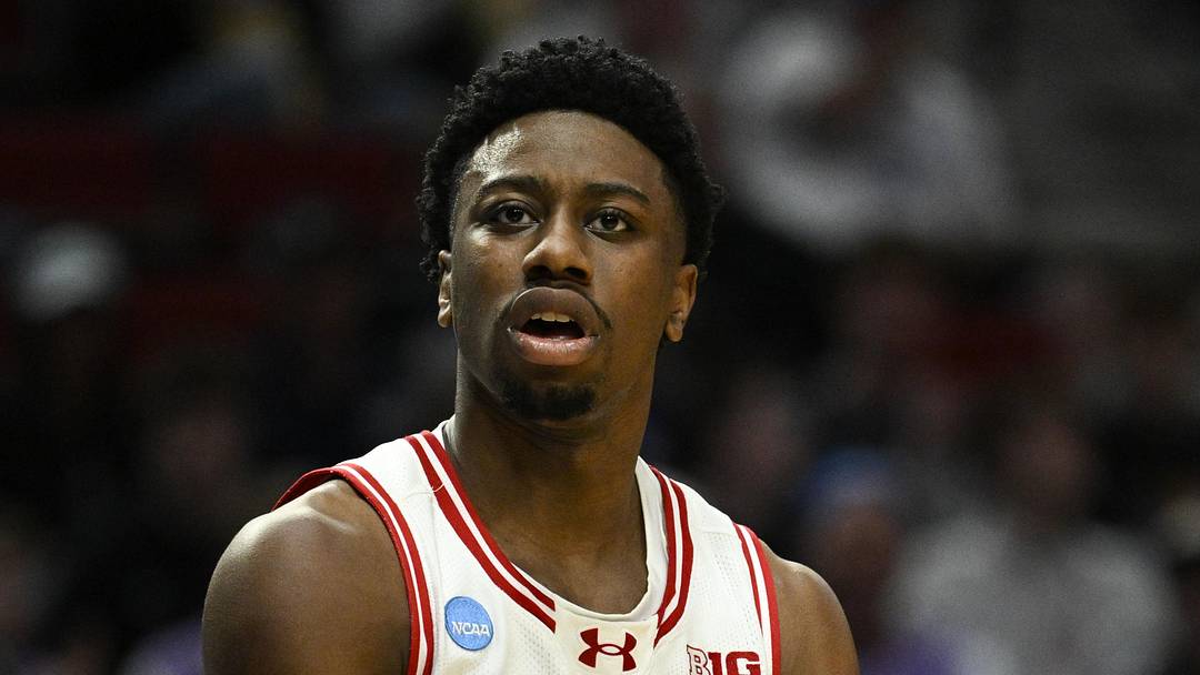 Mar 19, 2026; Portland, OR, USA; Wisconsin Badgers guard John Blackwell (25) reacts during the second half of a first round game of the men's 2026 NCAA Tournament against the High Point Panthers at Moda Center. Mandatory Credit: Troy Wayrynen-Imagn Images