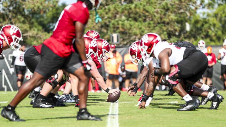 The 2024 Indiana football team lines up during fall camp.