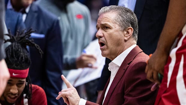 Razorbacks coach John Calipari instructs his team during the Hogs' road game at LSU.
