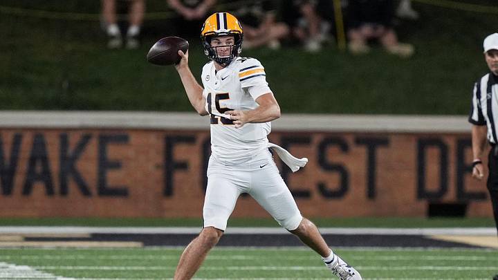 Nov 8, 2024; Winston-Salem, North Carolina, USA; California Golden Bears quarterback Fernando Mendoza (15) throws against the Wake Forest Demon Deacons during the first half at Allegacy Federal Credit Union Stadium. Mandatory Credit: Jim Dedmon-Imagn Images
