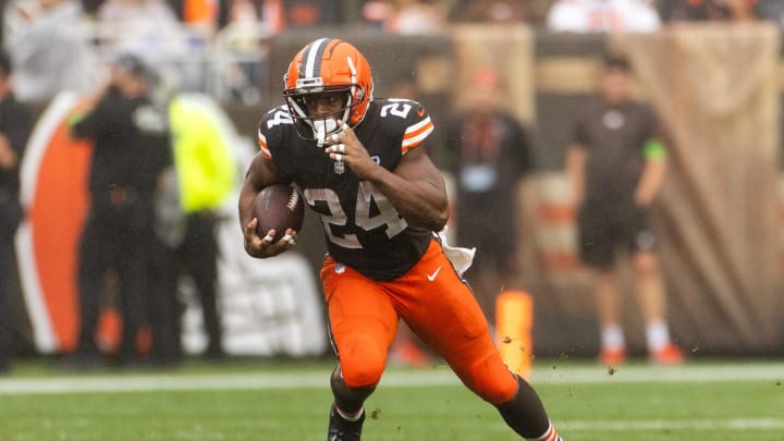 Sep 10, 2023; Cleveland, Ohio, USA; Cleveland Browns running back Nick Chubb (24) runs the ball against the Cincinnati Bengals during the third quarter at Cleveland Browns Stadium. Mandatory Credit: Scott Galvin-USA TODAY Sports