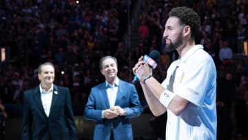 October 18, 2022; San Francisco, California, USA; Golden State Warriors guard Klay Thompson (11) talks in front of co-owners Peter Guber (left) and Joe Lacob (center) before the game against the Los Angeles Lakers at Chase Center. Mandatory Credit: Kyle Terada-USA TODAY Sports