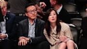 May 9, 2019; New York City, NY, USA; Taiwanese businessman Joe Tsai (left) looks on during the second half of the preseason WNBA game between the New York Liberty and the China National Team at Barclays Center.  Mandatory Credit: Vincent Carchietta-Imagn Images