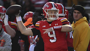 Nov 23, 2024; College Park, Maryland, USA;  Maryland Terrapins quarterback Billy Edwards Jr. (9) throws during the first half against the Iowa Hawkeyes at SECU Stadium. Mandatory Credit: Tommy Gilligan-Imagn Images