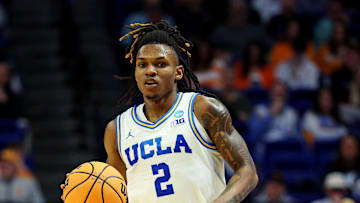Mar 20, 2025; Lexington, KY, USA;  UCLA Bruins guard Dylan Andrews (2) brings the ball up court during the second half against the Utah State Aggies in the first round of the NCAA Tournament at Rupp Arena. Mandatory Credit: Jordan Prather-Imagn Images