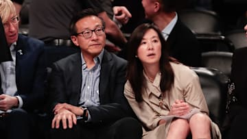 May 9, 2019; New York City, NY, USA; Taiwanese businessman Joe Tsai (left) looks on during the second half of the preseason WNBA game between the New York Liberty and the China National Team at Barclays Center.  Mandatory Credit: Vincent Carchietta-Imagn Images