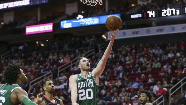 Feb 11, 2020; Houston, Texas, USA; Boston Celtics forward Gordon Hayward (20) shoots the ball as Houston Rockets forward Thabo Sefolosha (18) defends during the third quarter at Toyota Center. Mandatory Credit: Troy Taormina-USA TODAY Sports